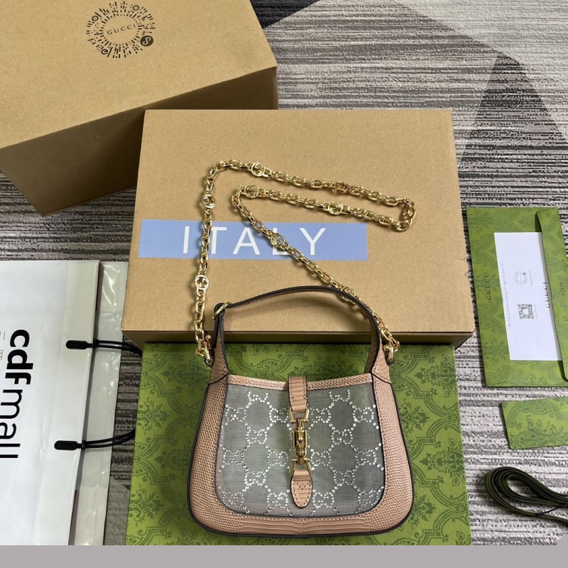 G*u*i top handle bags